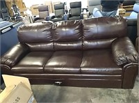 Leather couch with rip on back