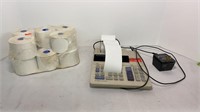 Electronic calculator with 11 rolls of paper