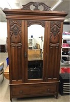 Carved Armoire with Beveled Mirrored Door,