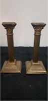 Pair of brass candle sticks. Each are 8" tall