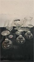 Group of glass margarita glasses, and pitcher and