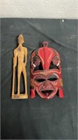 10” and 9” wooden statue with mask