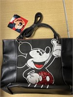 New unused Mickey Mouse purse/tote bag.
Removed