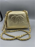 Vintage Coco Chanel handbag with chain strap gold