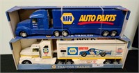 New in box NAPA toy tractor trailers