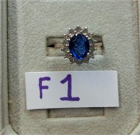F1- sterling ring w/lg. dark blue stone & clear