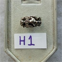 H1- sterling ring w sculptural erotic motif size