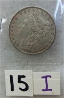 15I- 1879 Morgan silver dollar