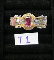 T1- ornate filigree bracelet w/ pink/red stone