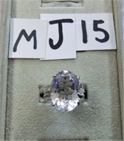 MJ15- sterling ring w/lg clear oval stone having