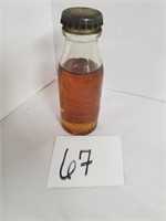 One full unused Edison bottle with oil