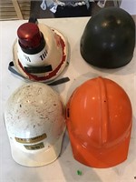 Four different types of helmets plastic