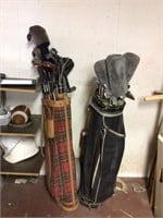 Two bags of vintage golf clubs