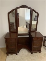 Wooden makeup vanity with mirror and stool