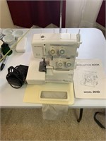 Janine Mylock 204d Surger sewing machine