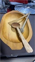 Wooden bowl with wooden utensils