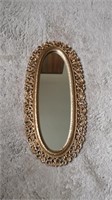 Oval mirror. Plastic (or resin) 23" x 11"