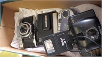 box of misc cameras
