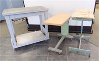 WORKBENCH ON CASTERS & (2) OLD HOSPITAL BED TRAYS.