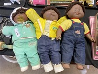 3 Cabbage Patch Kid dolls.