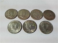 Four Franklin half dollars 1951, 1961 D and 1963