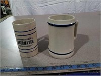 2 stoneware mugs one is advertising Obermayer