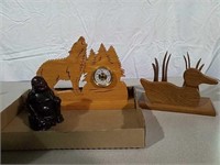 Small Buddha, wolf clock and duck bookend