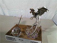 Dragon and sword sculptures