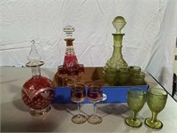 Two decanters and glass sets