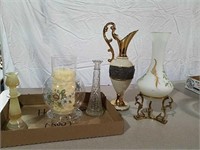 Vases, candle holder, pitcher and vase on metal