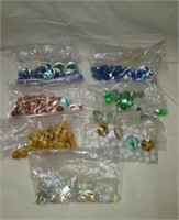 7 bags of Marbles with 1 to Shooters in each bag