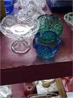 Trio of glass dishes. A blue one, a green one,