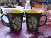 Pair of Disney's Jiminy Cricket ceramic mugs.