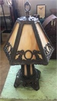 Another heavy table lamp. Brown stained glass