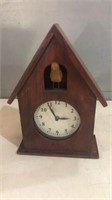 Wood battery operated clock with bird in top