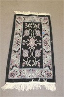 SMALL FRINGED AREA RUG