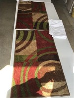 2 small rugs apx 2’ x 3’ each