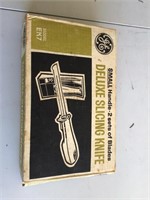 Vintage dellux slicing knife by GE in box