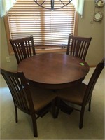 42" diameter like new magnificent table & chairs