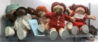 7 Cabbage Patch Dolls.