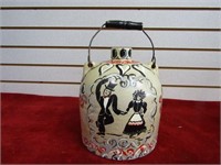 Folk art painted stoneware jug. w/handle.