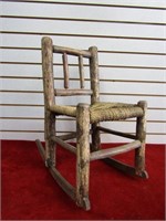 Primitive child's rocking chair. Rope seat.