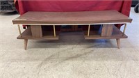 Wooden coffee table. Measures 47.5x17.5x14.5