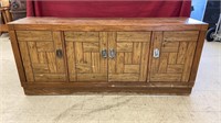 Wooden China cabinet. Measures 60x15x26.5 inches