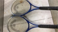 2 blue titanium tennis rackets