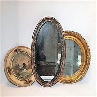 Two Oval Mirrors and Feather Art