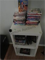 PLASTIC SHELVING UNIT VHS, DVD, AND CDS INCLUDED