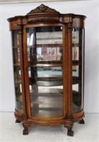 Intricately Carved Oak Triple Bowed China Cabinet