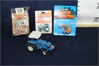 Lot of assorted small model tractor some Ertl