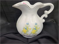 pretty white pitcher with blue & yellow flowers